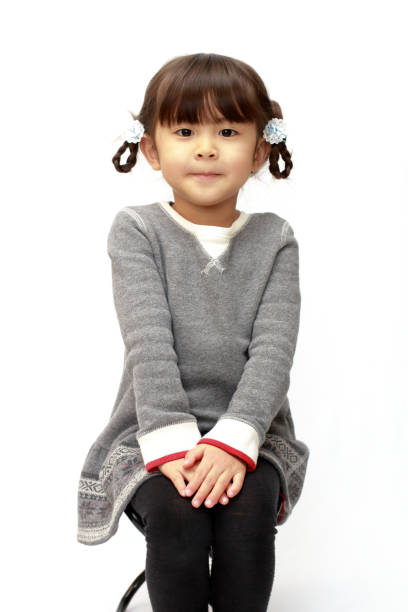 istock smiling Japanese girl (4 years old) (white back) 1136360752