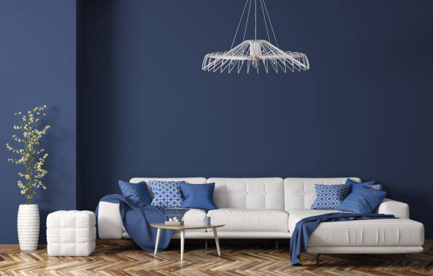 innenraum des modernen wohnzimmers mit weißem stoffsofa über blauer wand 3d rendering - coffee table living room indoors comfortable stock-fotos und bilder
