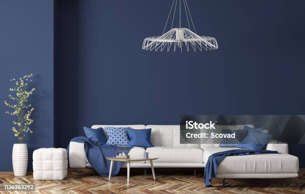 Interieur Van De Moderne Woonkamer Met Witte Stof Sofa Over Blauwe Muur 3d Rendering Stockfoto en meer beelden van Woonkamer