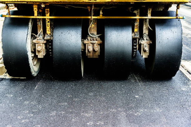 Background of asphalt roller that stack and press hot asphalt - Road roller Road Construction, Construction Industry, Industry, Thailand, Crew pavement ends sign stock pictures, royalty-free photos & images