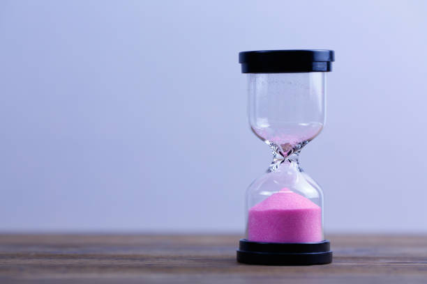 istock An hourglass.  Running out of time 1136366467