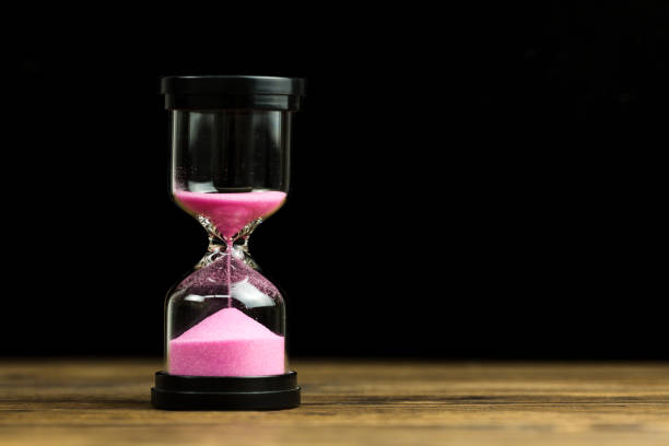 istock An hourglass.  Running out of time 1136366516