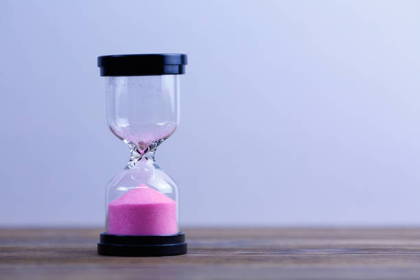 istock An hourglass.  Running out of time 1136367045