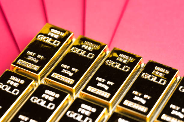 istock Gold bar, ingot or bullion on red envelope using as financial asset, saving or investment concept 1136367587