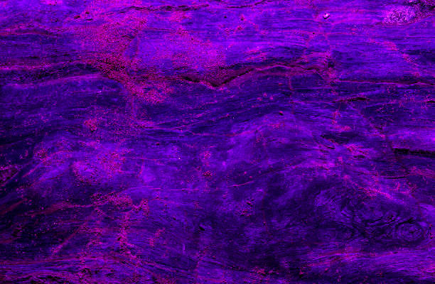 istock Neon purple, blue and pink colors abstract stone background. 1136368978