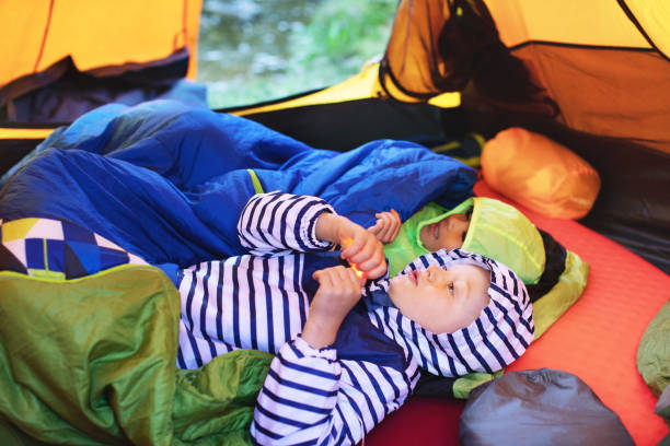 istock Children camping in mountains 1136370902