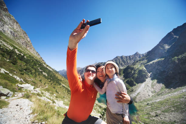 istock Family making selfie in mountains 1136371023