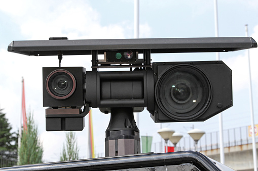 Patrol Vehicle Mounted Surveillance CCTV Camera Lens at Pole