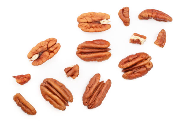 istock pecan nut isolated on white background. Top view. Flat lay 1136378273