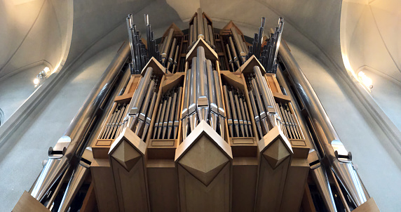 REYKJAVIK, ICELAND - July 2, 2018: Pipes of the organ in Hallgrimskirkja Church, bottom view