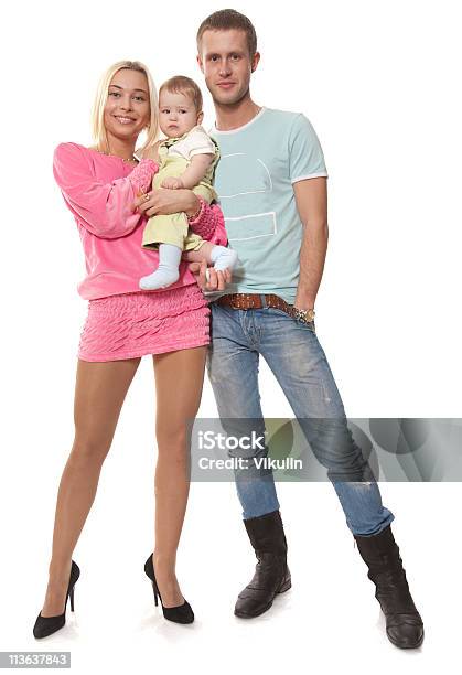 Familia Joven Foto de stock y más banco de imágenes de Adulto - Adulto, Alegre, Belleza