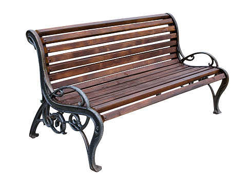 Wooden park bench with brown wood seats and forging elements on white background. Park and landscape.