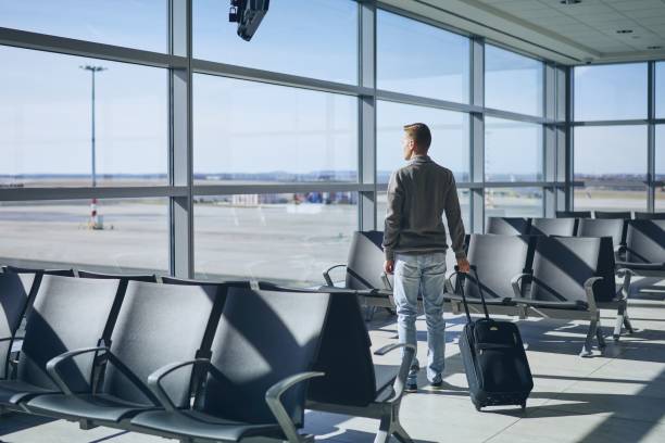 istock Traveler in airport terminal 1136382139