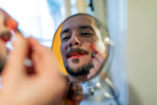 istock Bisexual Person Doing a Makeup at Home 1136383027