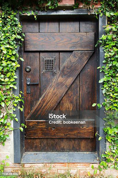 Secret Garden Door Stock Photo - Download Image Now - Backgrounds, Brick, Brown