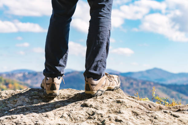 istock Man at the edge of a cliff 1136383244