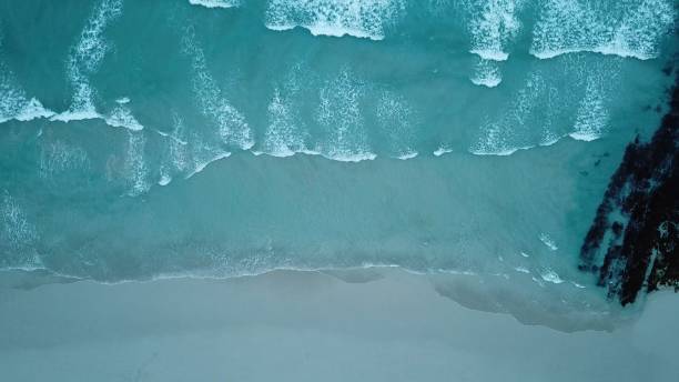 istock Waves breaking on the beautiful coastline 1136384399