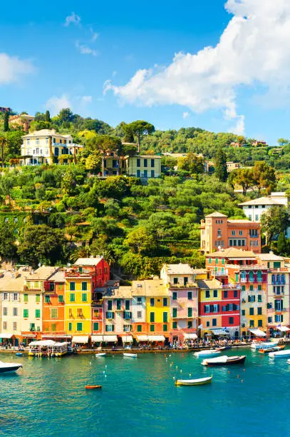 Beautiful sea coast with boats and colorful houses in Portofino, Italy