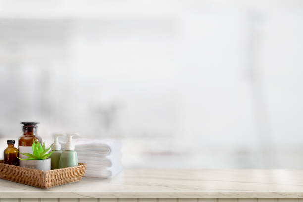 istock Ceramics shampoo or soap, Towels on top marble counter with copy space on bathroom background. 1136385589