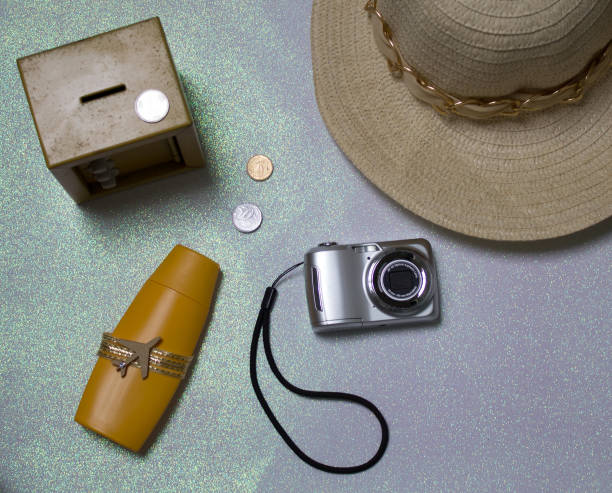 istock Things for the trip, beach hat, safe money, camera, sunscreen, mdf 1136385721