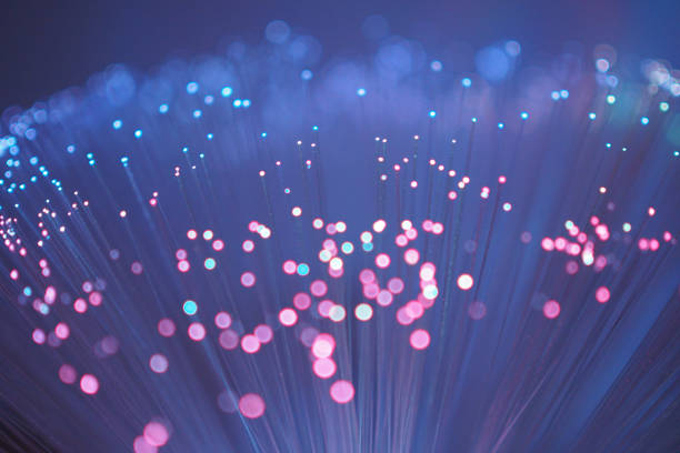 istock Pink and blue fibre optics 1136387568