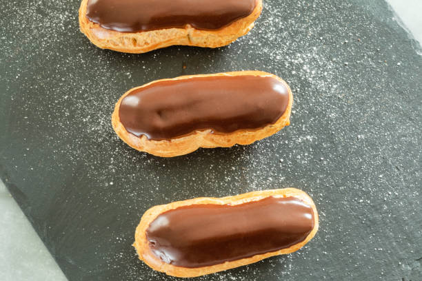 Traditional french pastry : aerial view of Eclair with chocolate icing stock photo