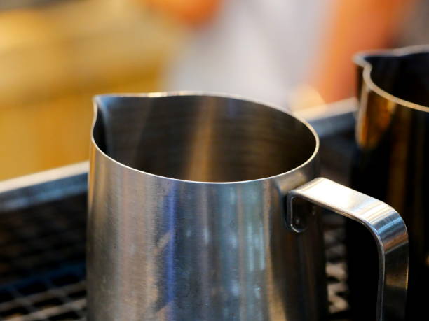 istock Barista making coffee milk 1136391546