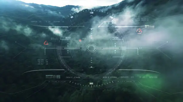 Aerial view from the fighter plane's cockpit flying over the low cloud cover mountain scape with head up display acquire targets and enemies location hidden in the dense mountain forest