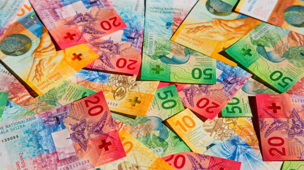 schweizer franken - swiss francs swiss currency switzerland finance stock-fotos und bilder