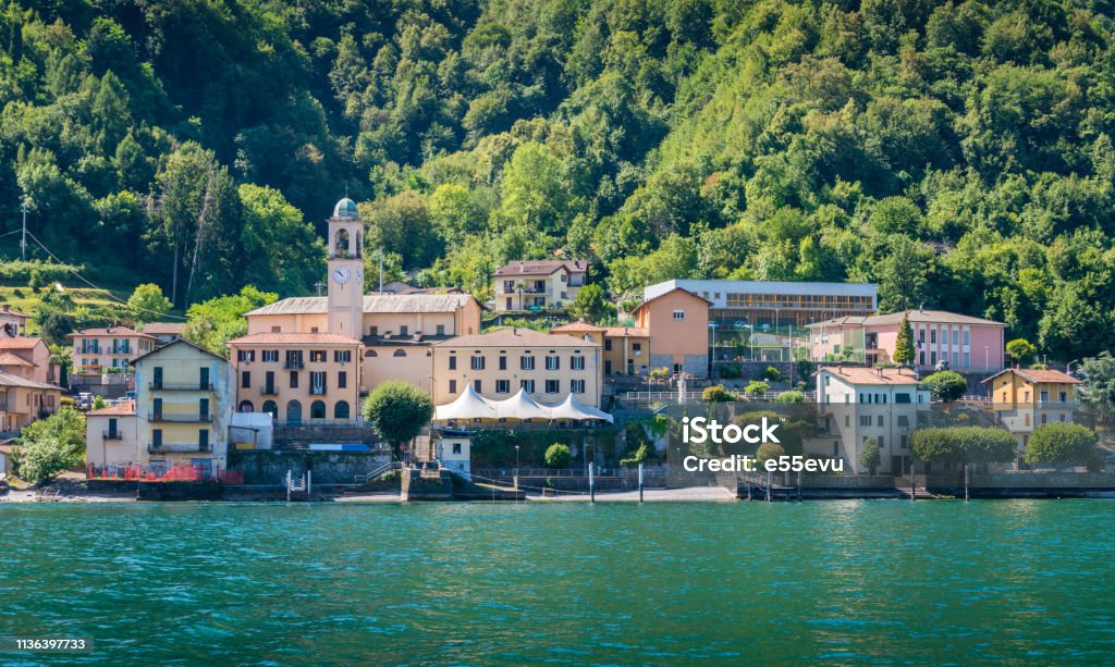 Lezzeno waterfront as seen from the ferry, Lake Como, Lombardy, Italy. Architecture Stock Photo