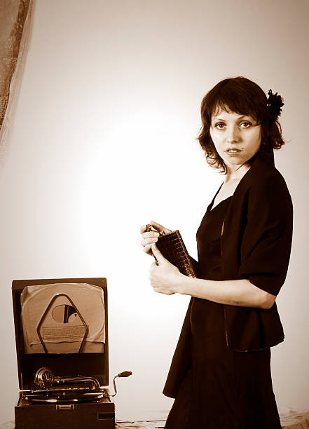 istock Girl with a gramophone. Vintage. 113639871