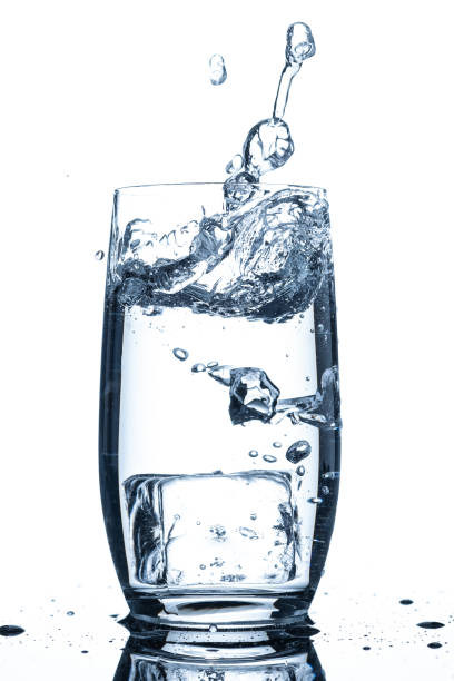 istock Glass of water witer drops and ice cube 1136398968