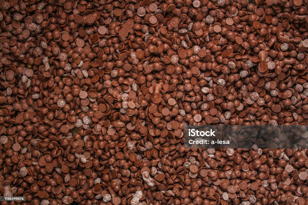 chocolate drops (sweets). food background. copy space. top chocolate drops (sweets) Anaerobic Exercise Stock Photo