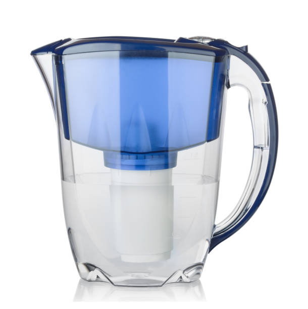 istock Water filter in a plastic jug isolated on white 1136403099