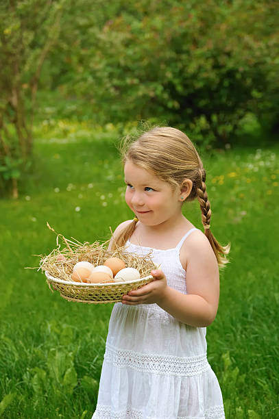 istock Little girl holding fresh eggs 113640334