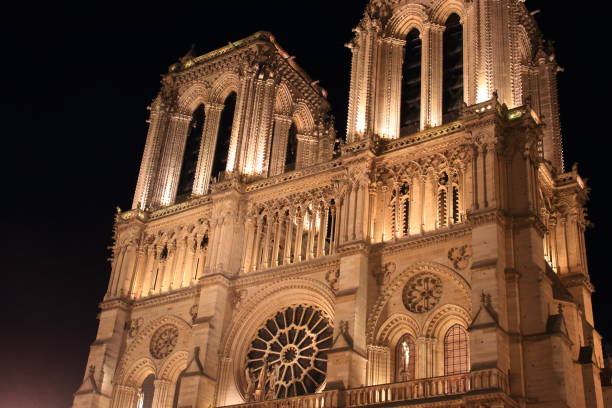 istock Notre Dame Cathedral in Paris and its lighting at night 1136403747