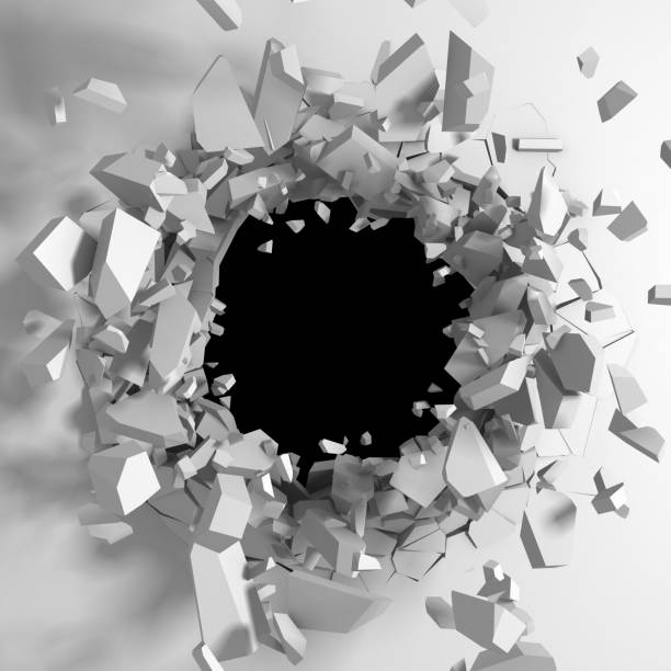 istock Dark cracked broken hole in concrete wall 1136405389