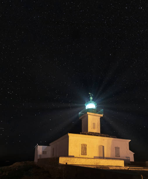 istock Lighthouse of L'lle-Rousse (Corsica) at night 1136409450