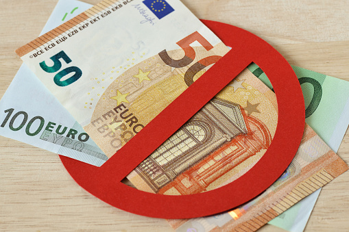 Close-up of euro banknotes in prohibition sign - No money concept