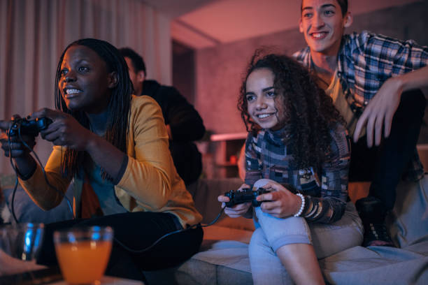 istock Friends playing video games at home 1136410345
