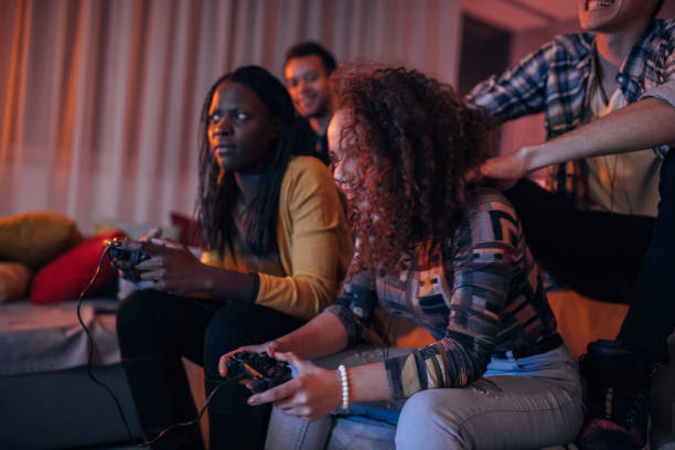 istock Friends playing video games at home 1136411442