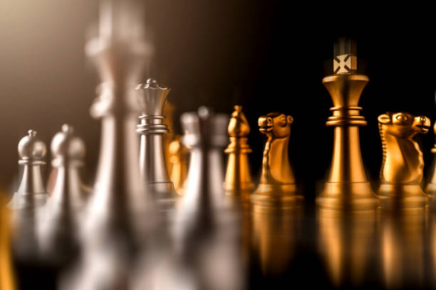istock business strategy brainstorm chess board game with hand touch black background with free copy space for your text 1136411687
