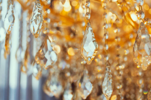 istock blur and defocus crystal chadelier shiny glitter abstract background 1136411743