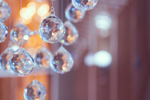 istock blur and defocus crystal chadelier shiny glitter abstract background 1136411803