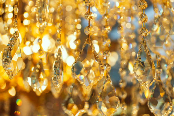 istock blur and defocus crystal chadelier shiny glitter abstract background 1136411805