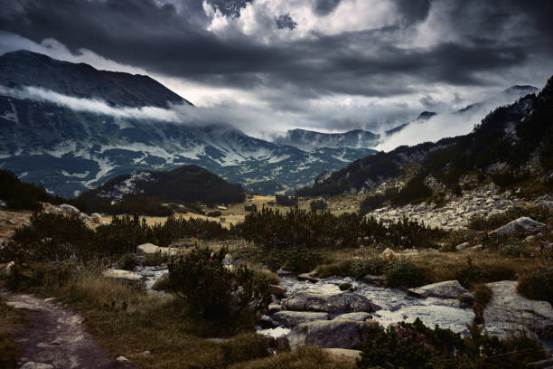 istock Valley and lake in the mountains at sunset 1136411923