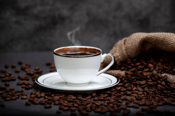 Hot turkish coffee and roasted coffee beans