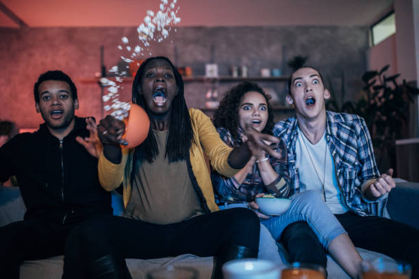 istock Friends watching TV 1136413888