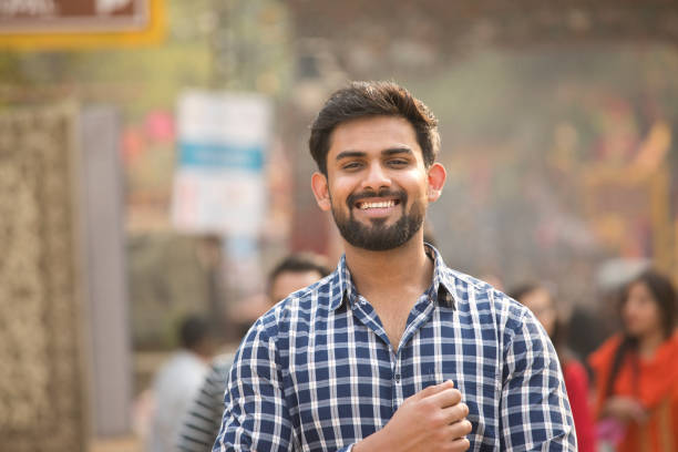 istock Young man at street market 1136418044