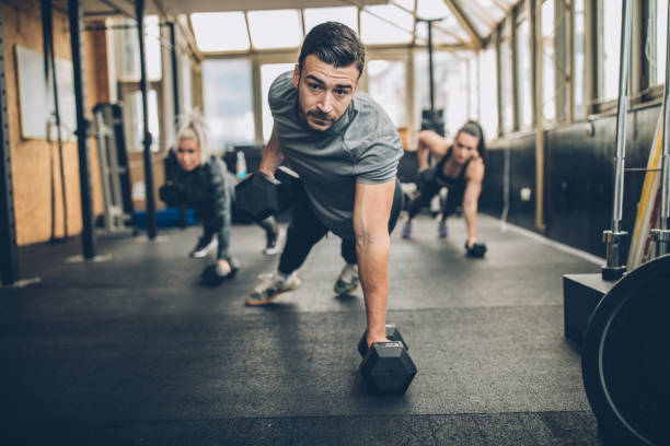 istock Personal Weight Training In The Gym 1136419489